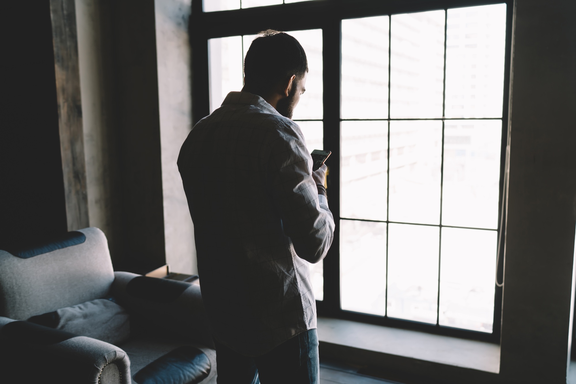 Man text messaging on smartphone