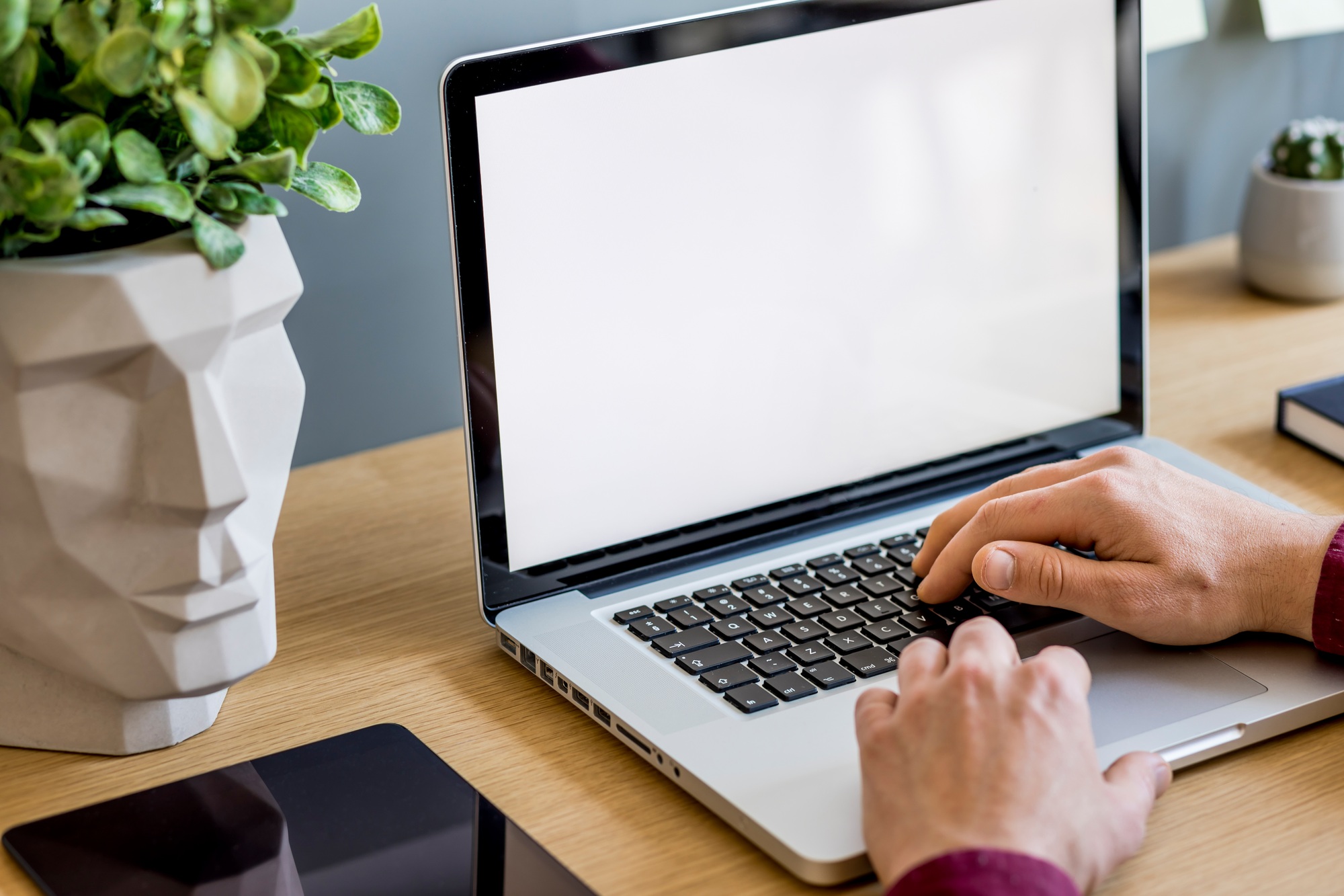 Stylish home office composition of mock up laptop screen